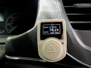 Original thermostat mounted on dash