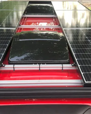 x6 100W solar panels on roof of camper van